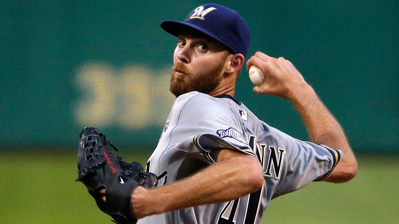 Taylor Jungmann pitched seven efficient innings in his major league debut to lead the Milwaukee Brewers to a 4-1 win over the Pittsburgh Pirates on Tuesday night (Gene J. Puskar/AP)