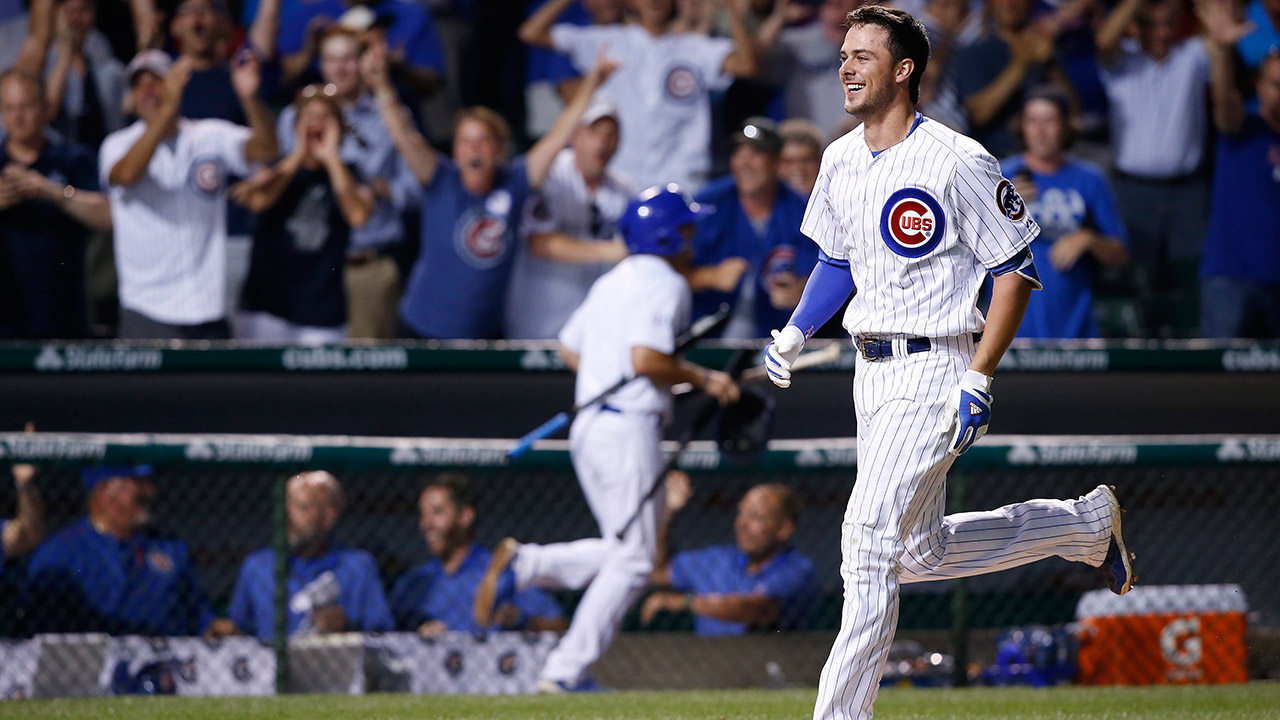 Kris Bryant's two-run homer with two outs in the bottom of the ninth inning lifted the Chicago Cubs to a 9-8 victory over the Colorado Rockies 9-8 on Monday night (Andrew A. Nelles/AP)
