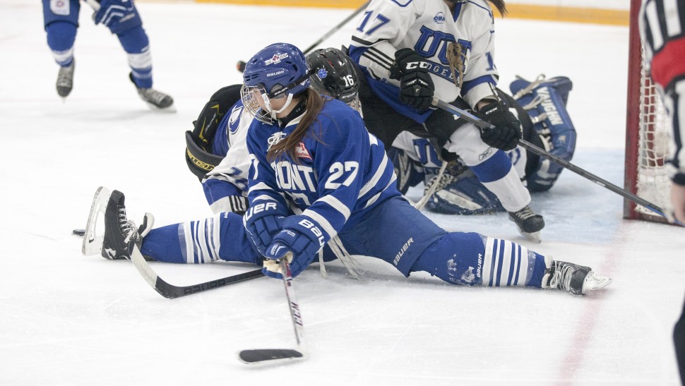 Toronto Furies forward Carolyne Prevost does the splits in the heat of a scoring chance during a preseason game against the UOIT Ridgebacks.