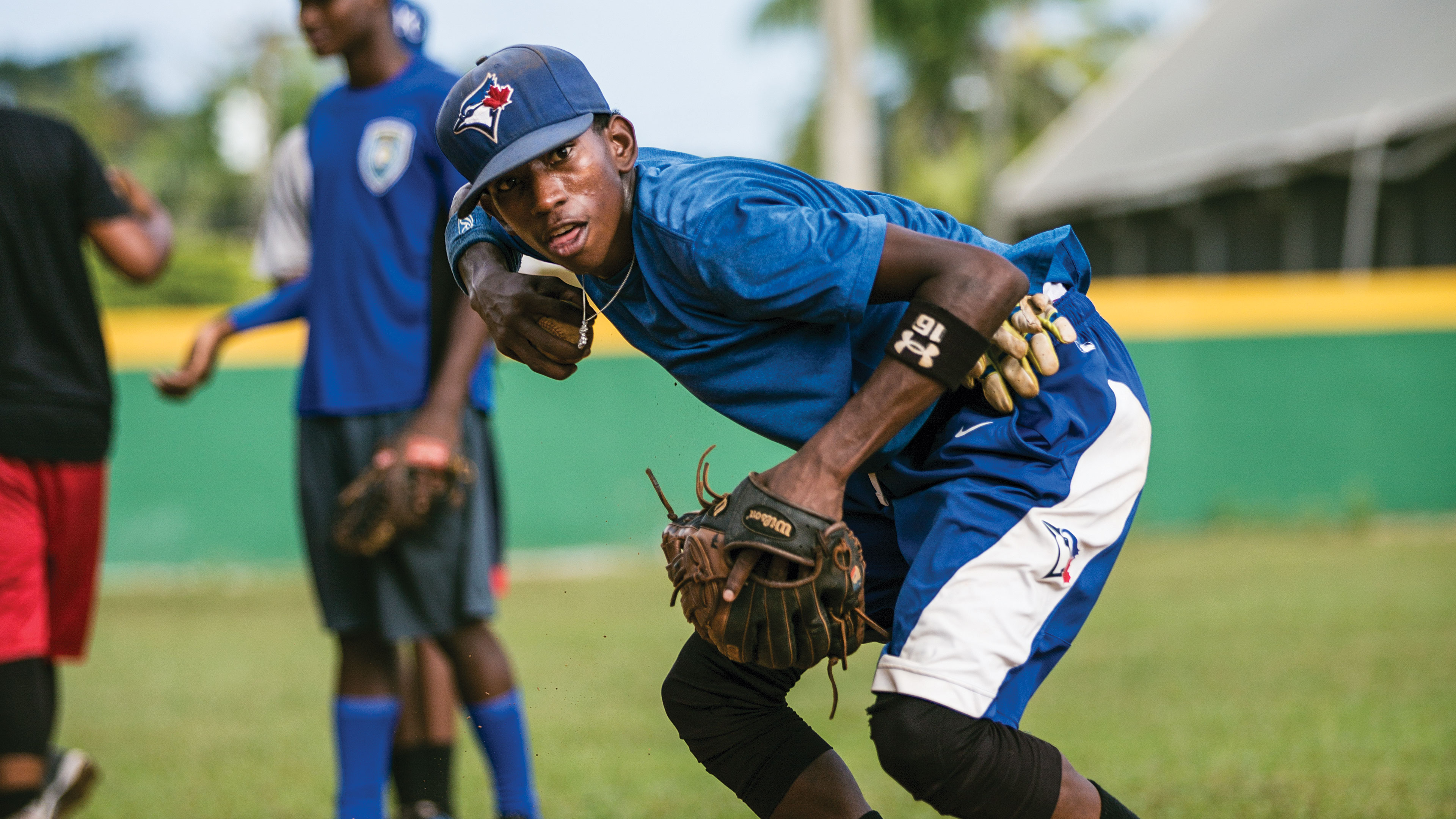 On the ground at a grassroots Dominican baseball academy