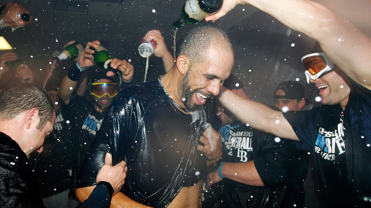 The Tampa Bay Rays pour beer and champagne on pitcher David Price (Tony Gutierrez/AP)