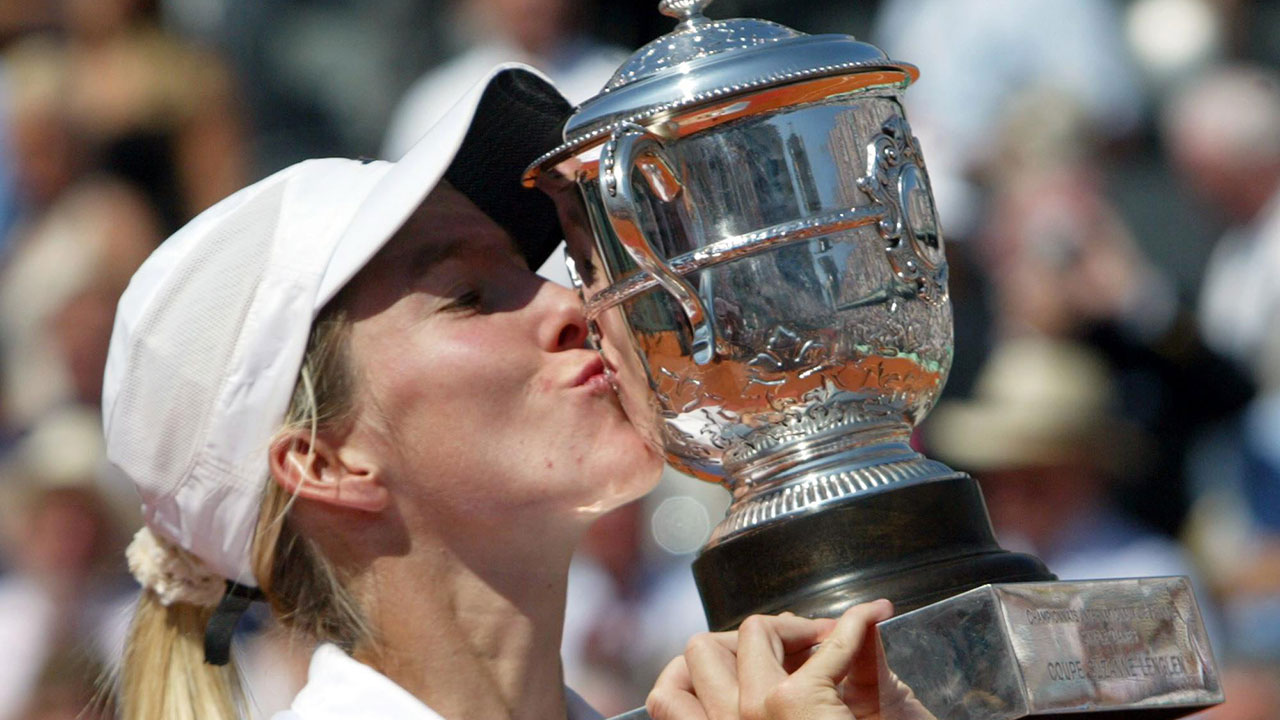 Justine Henin kisses the cup after winning the 2003 French Open. (Michel Euler/AP)