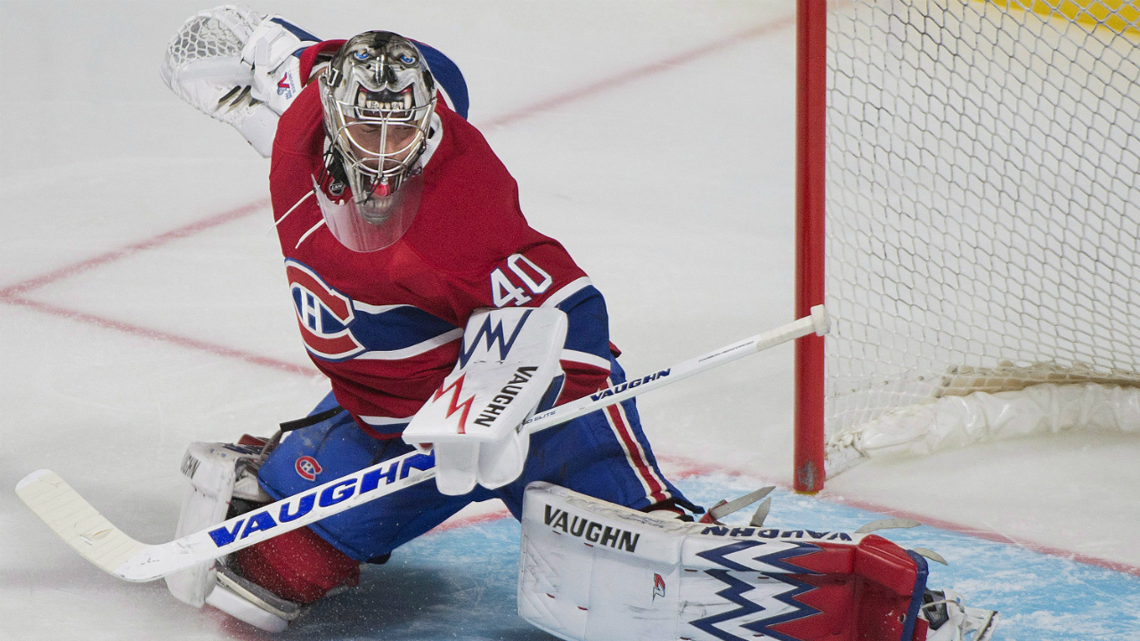 Montreal Canadiens goalie Charlie Lindgren makes a save during third period NHL pre-season hockey action against the New Jersey Devils in Montreal, Monday, September 26, 2016. (Graham Hughes/CP)