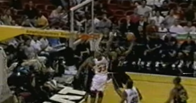 Vince Carter dunks on Alonzo Mourning. (YouTube)