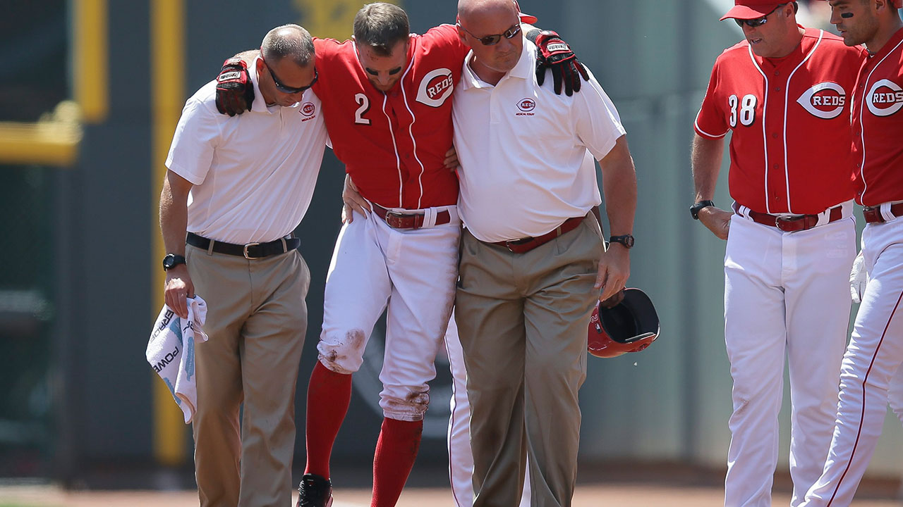 Cincinnati Reds' Zack Cozart will need nine months of rehab following reconstructive knee surgery. (John Minchillo/AP) 