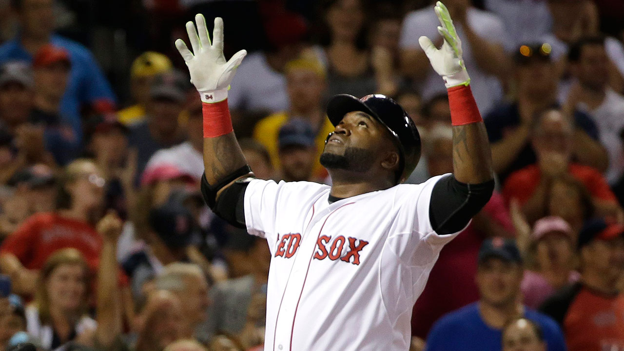 Boston Red Sox's David Ortiz celebrates his three-run home run. (Steven Senne/AP)