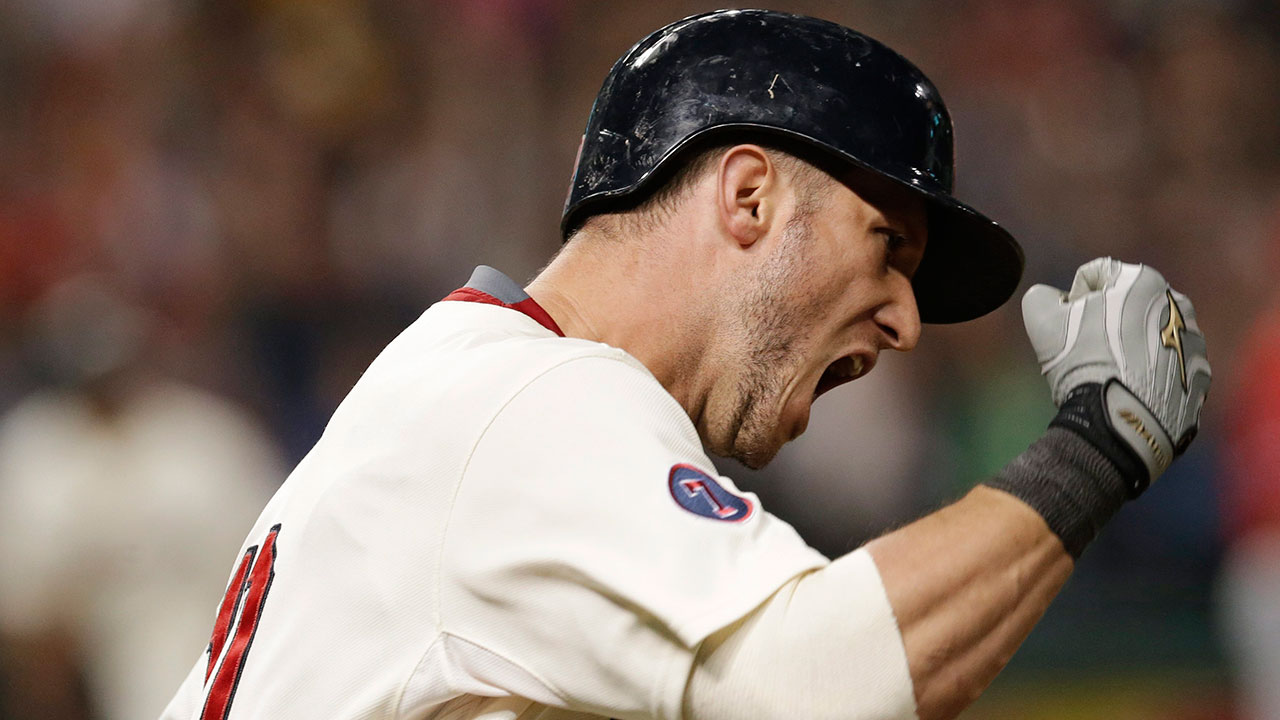 Cleveland Indians’ Yan Gomes reacts after hitting a grand slam off Los Angeles Angels relief pitcher Joe Smith. (Tony Dejak/AP)