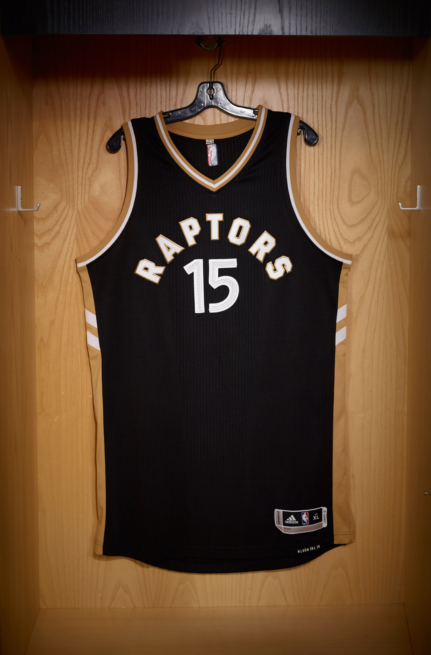 black and gold raptors jersey