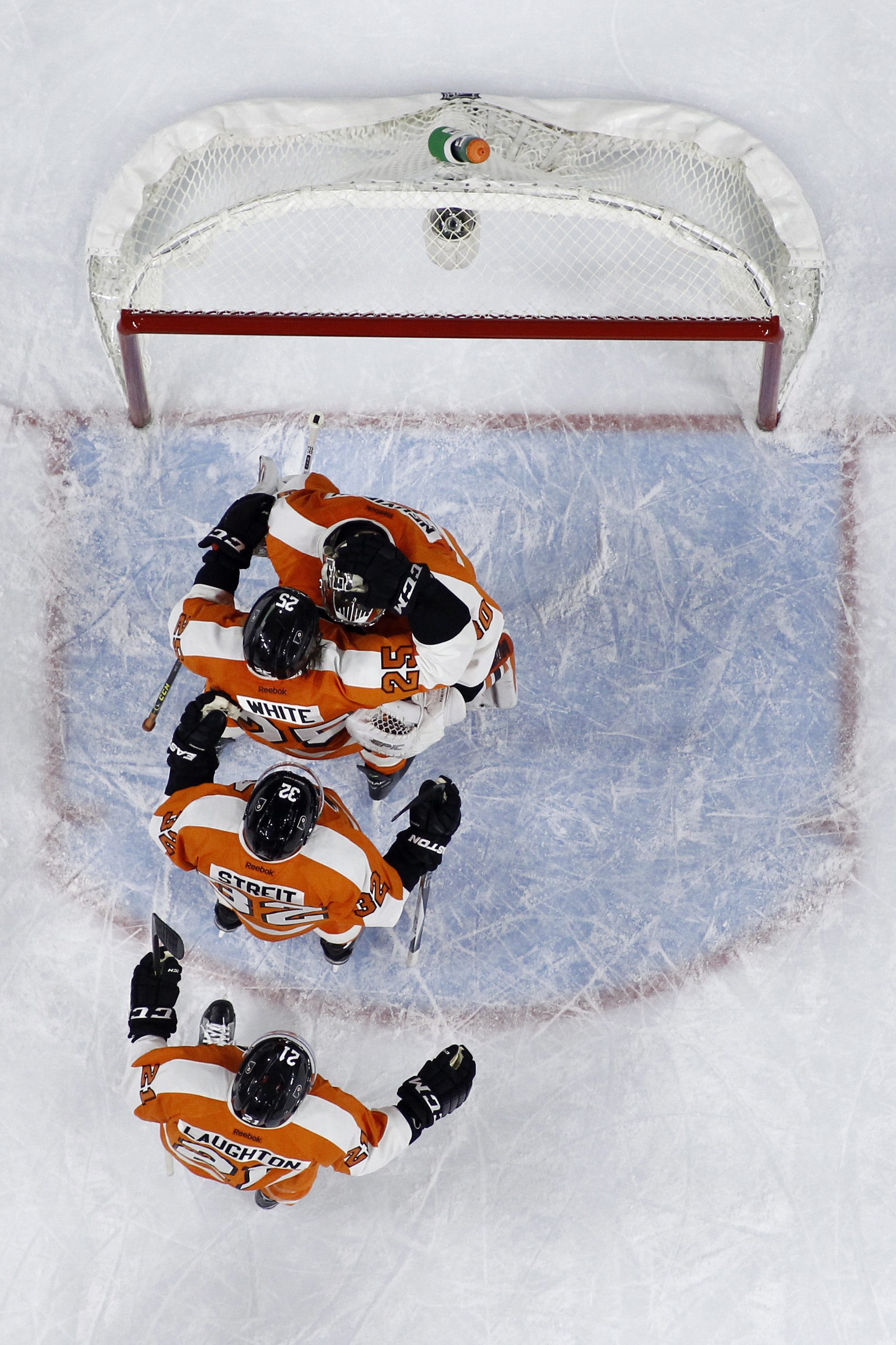 Michal Neuvirth, Mark Streit, Scott Laughton, Ryan White