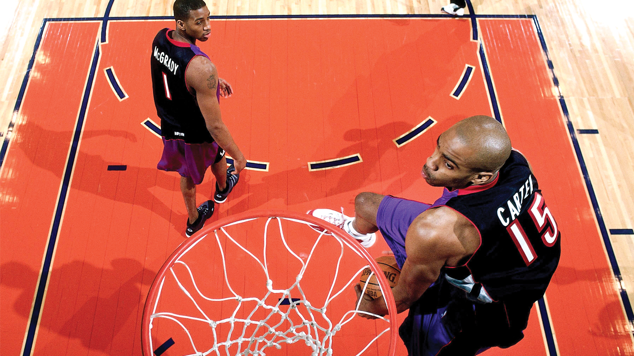 Vince Carter of the Toronto Raptors goes for a dunk during the 2000