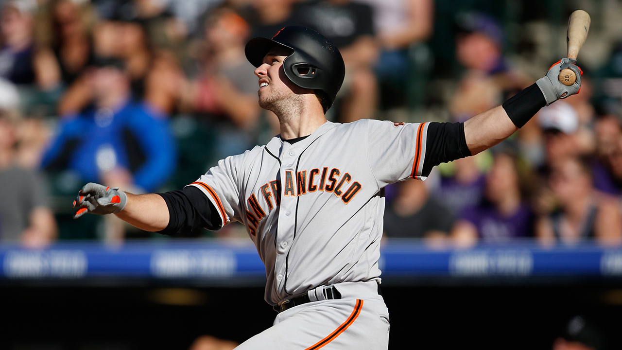 Buster Posey hit a pair of three-run homers, including a tiebreaking drive as part of a six-run eighth inning, and the San Francisco Giants rallied for a 10-5 win over the Colorado Rockies on Saturday after their bullpen blew a lead (David Zalubowski/AP)