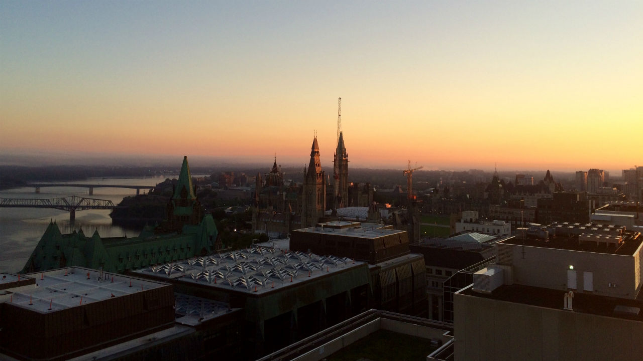 Sunrise Monday morning over the parliament buildings. (photo: Chris Johnston)