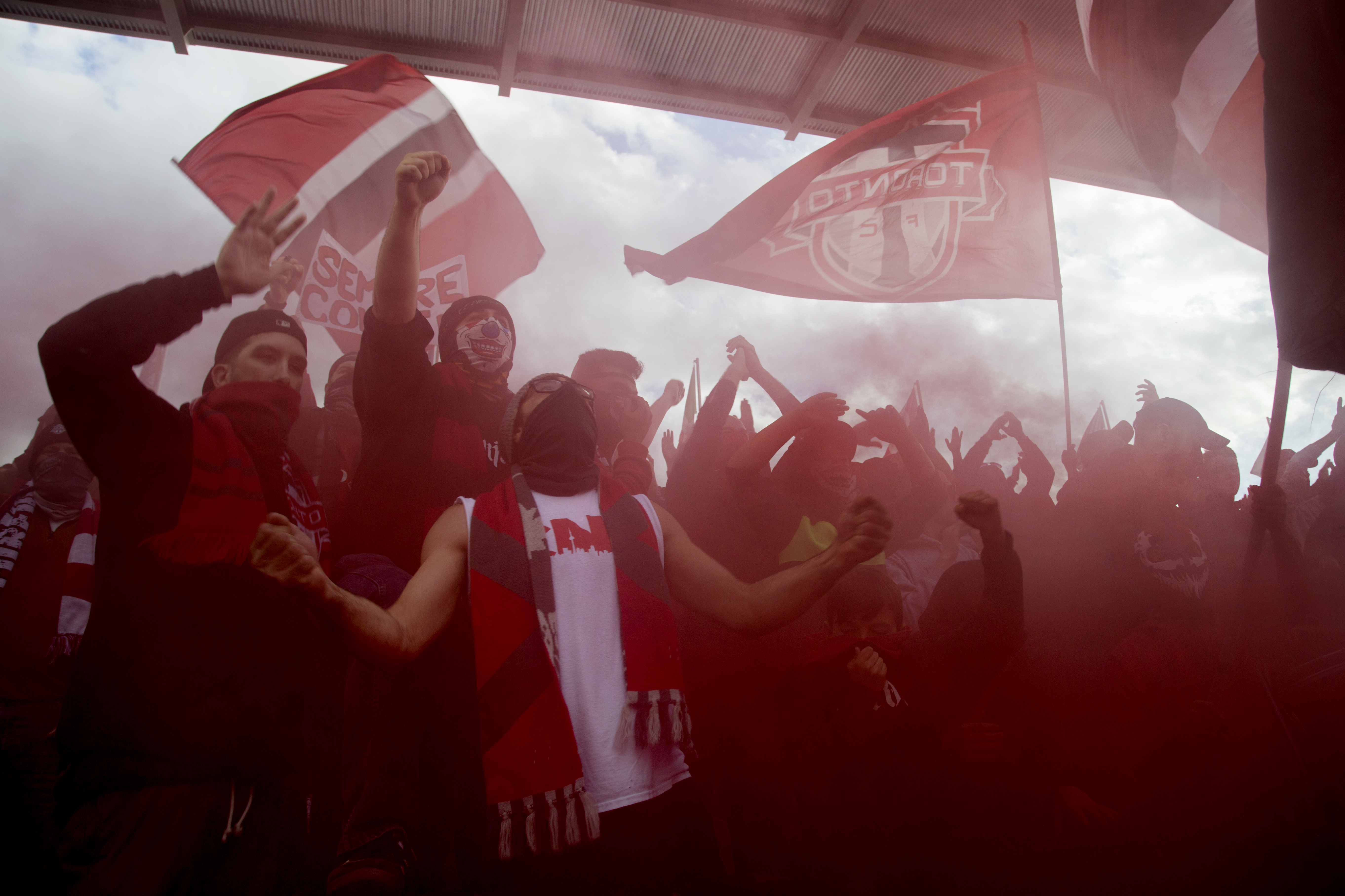 Toronto FC supporters cheer in the stands at BMO Field during their team's playoff matchup against the Philadelphia Union on October 26, 2016. (Maggie Naylor)