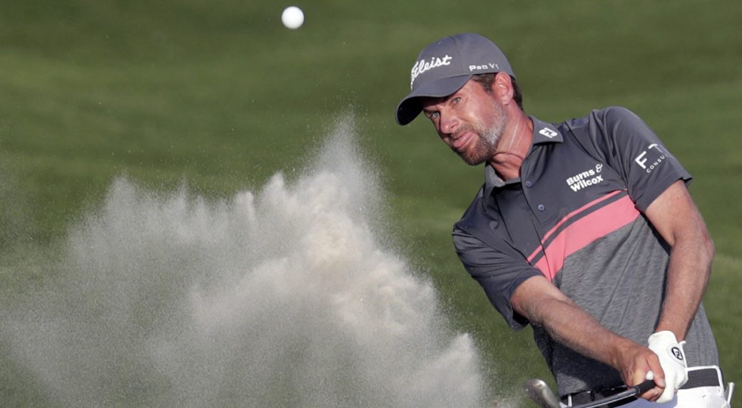 Simpson roars into big lead as McIlroy misses cut