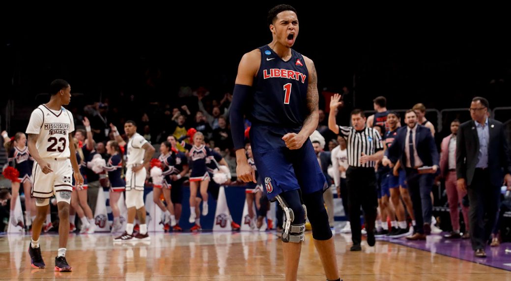 Liberty upsets Mississippi St. for 1st tourney win